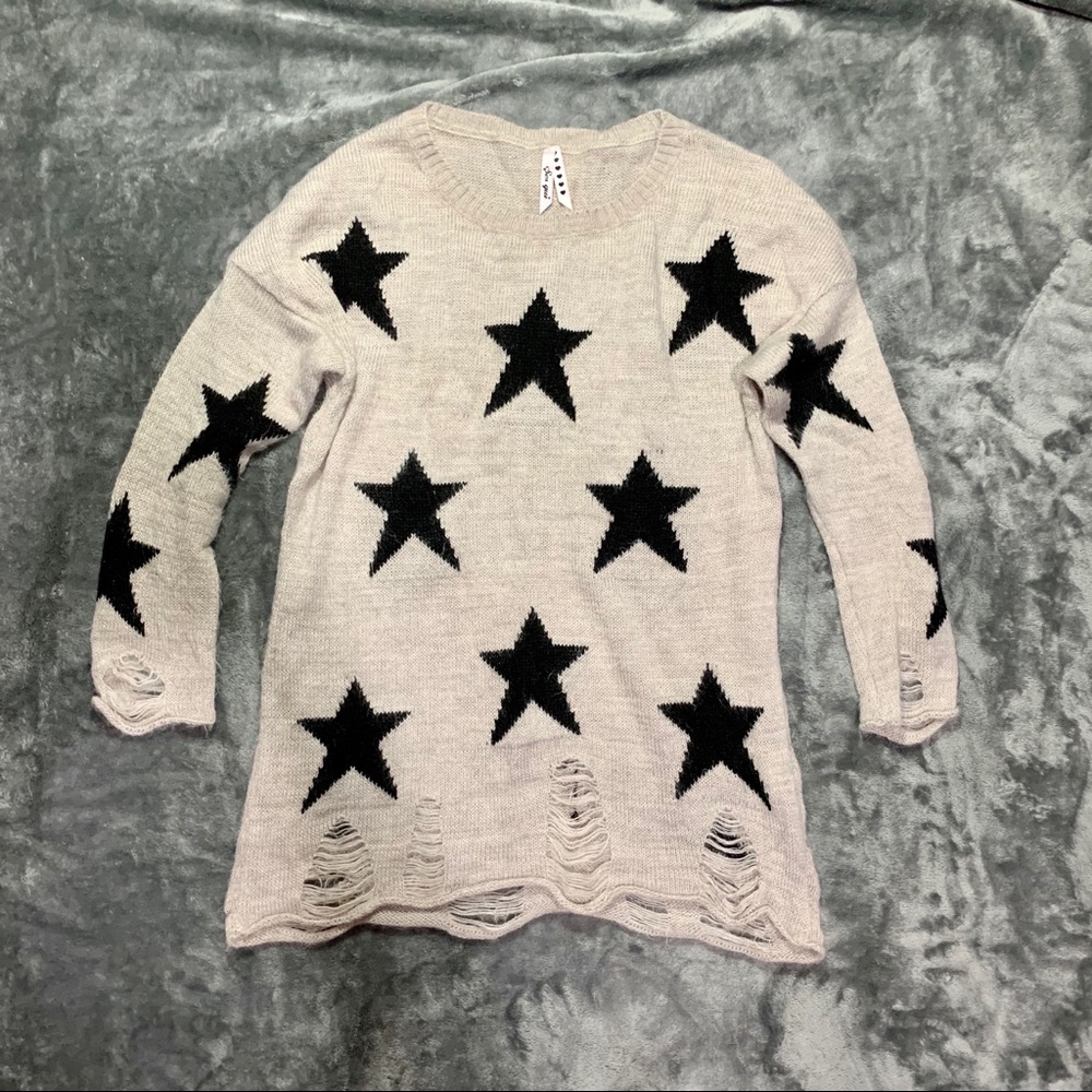 Distressed stars sweater